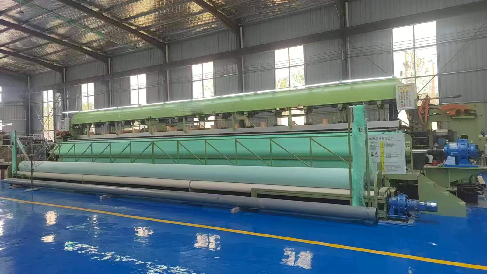 Wide-Width Paper Machine Fabric Loom